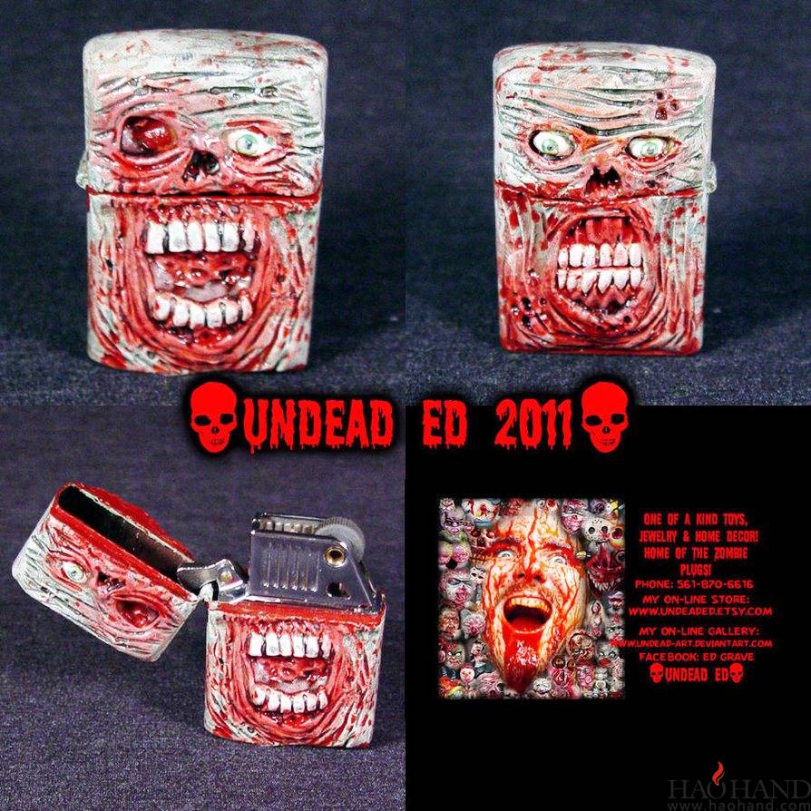 zombie_zippo_lighter_by_undead_art-d4886qi.jpg