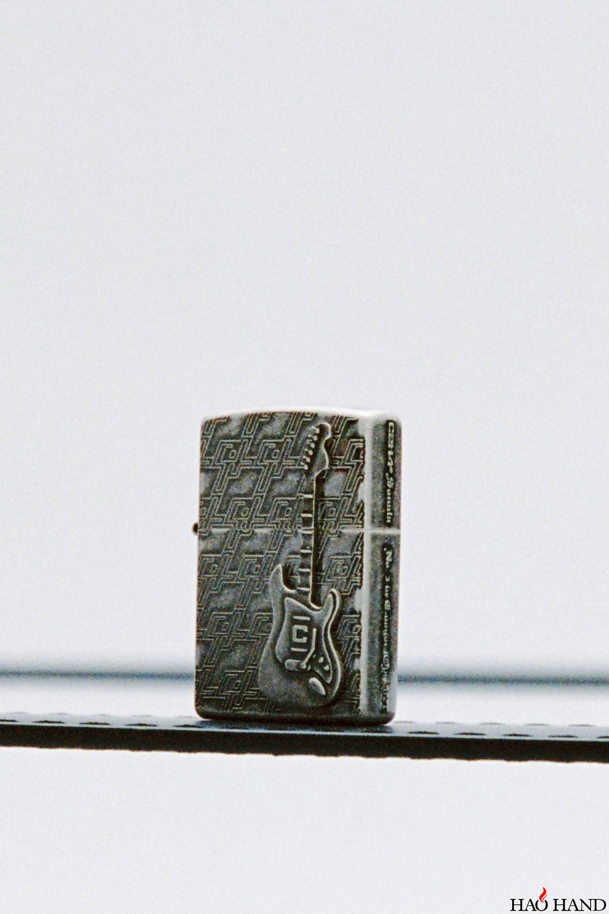 https___hypebeast.com_image_2021_07_c2h4-zippo-guitar-lighter-release-r003-02.jpg