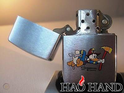 original-disney-donald-duck-zippo-50_1_dcab6f6ad637c51a575a1647a63fc3d0.jpg